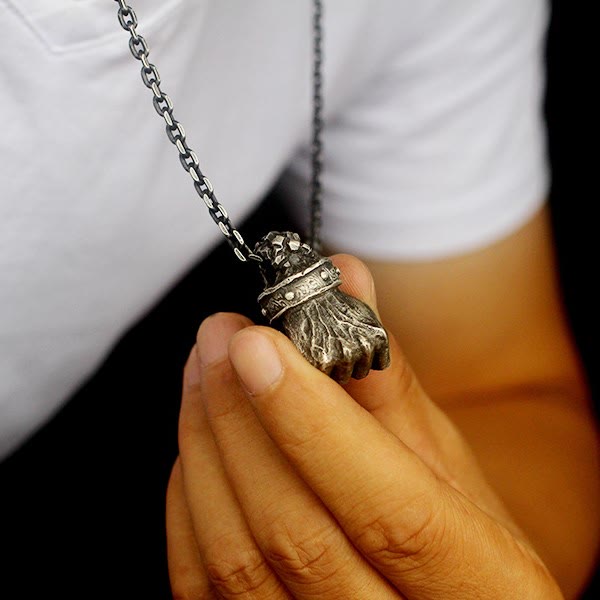 Powerful Fist of Fate Hammering Gesture Necklace
